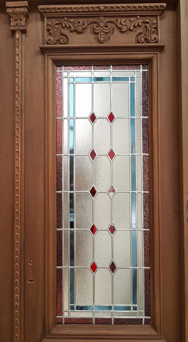 Puerta de cedro de doble hoja con vitraux